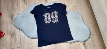 Tee-shirt Mc "89" in extenso 8 ans en parfait état