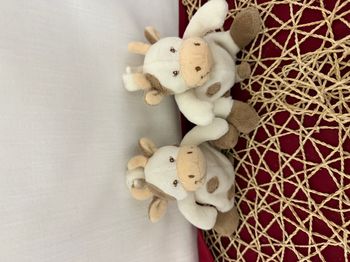 Doudou vache daisy blanche tachetée JOLLYBABY