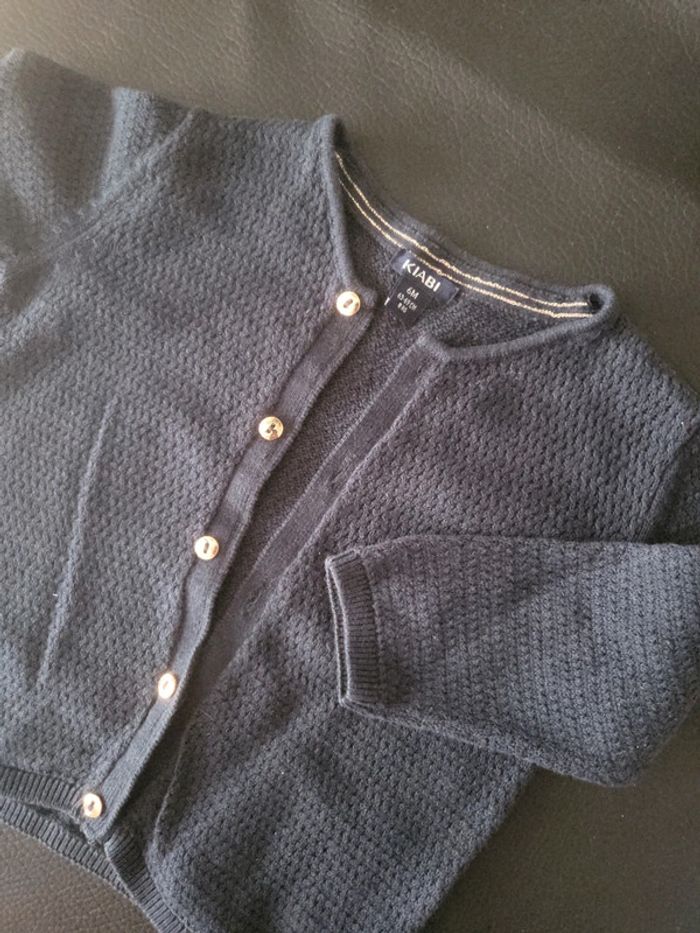 Gilet avec boutons dorés