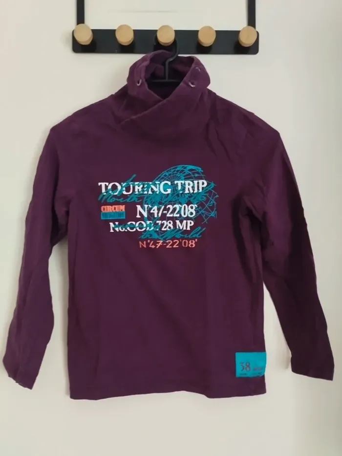 Jolie polo manches longues taille 10 ans