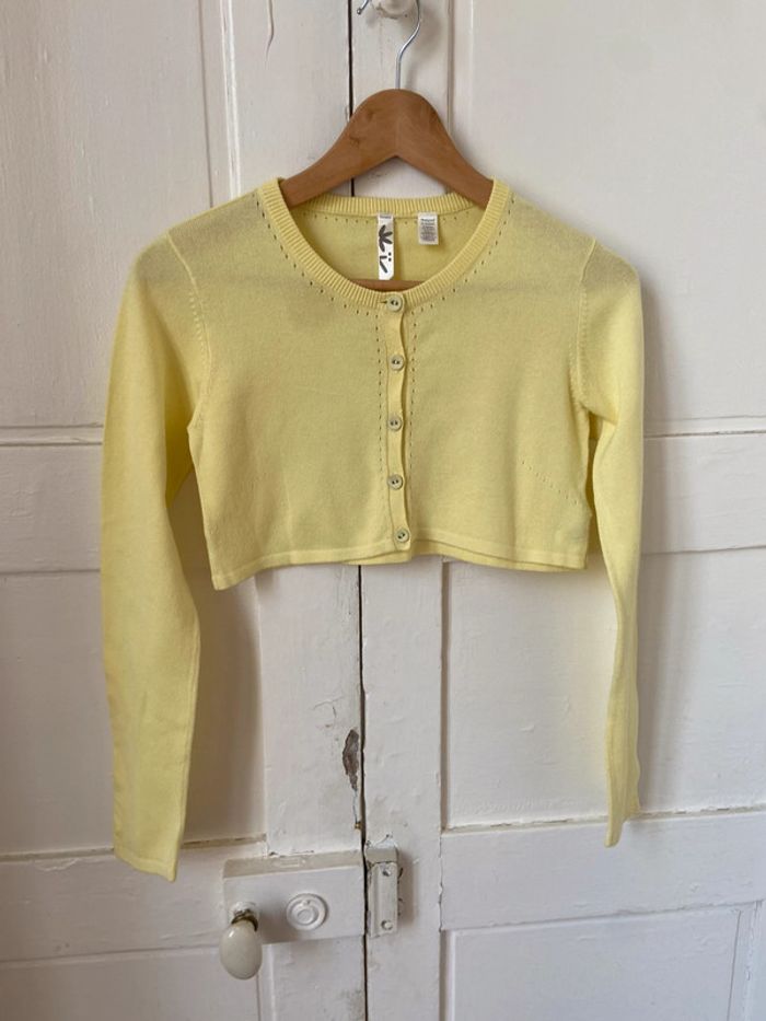 Boléro Okaïdi neuf jaune taille 12 ans