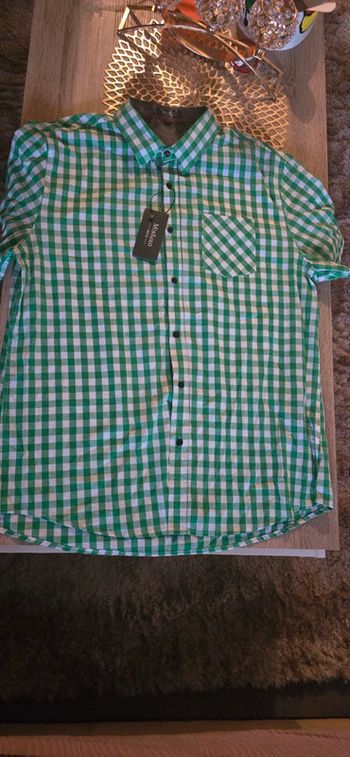 Chemise a carreaux manches courtes taille L