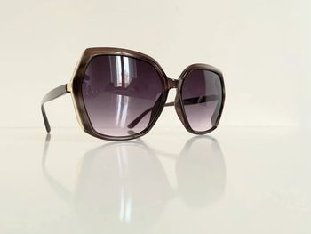 Lunette de soleil femme hexagonale marron miel et dorée verres dégradés uvprotection catégorie 3