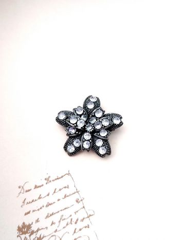 Magnifique broche vintage fleur argenté