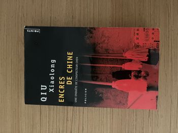 Encres de Chine - Qiu xiaolongLivre de poche pas tout jeune mais qui reste en très bon état. Beaucou