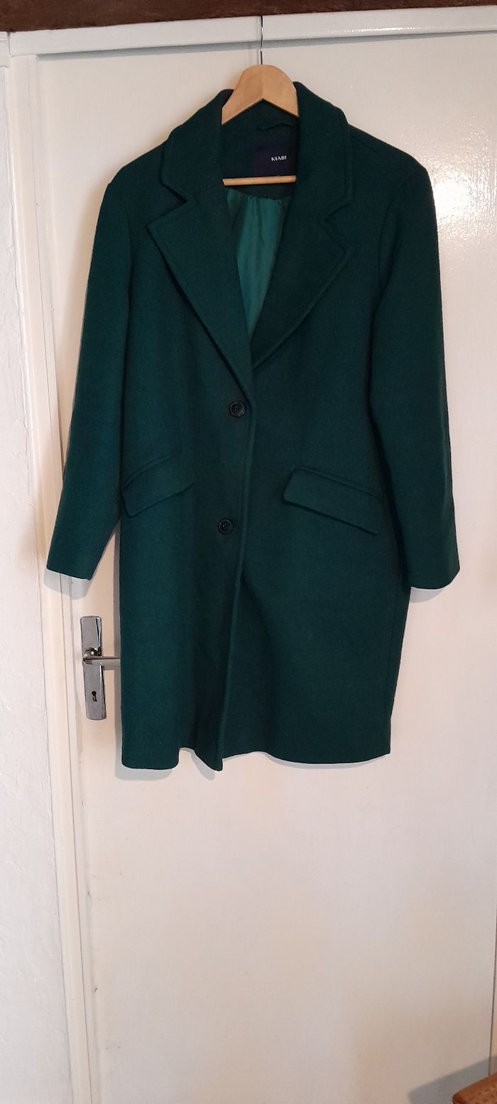 Manteau vert l'ai.e