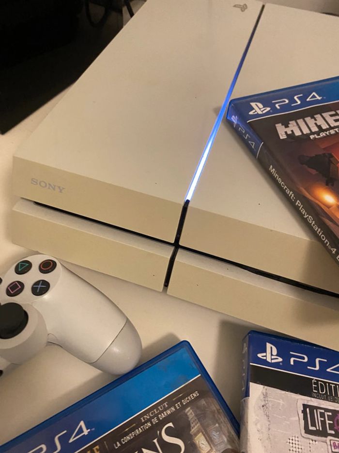 PS4 Blanche 500 Go en très bon état + Manette officielle + 3 Jeux - photo numéro 4