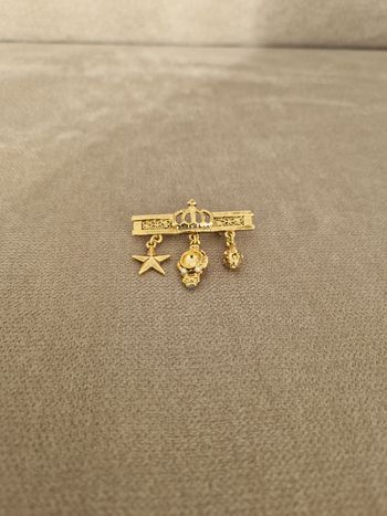 Broche dorée décorative vintage