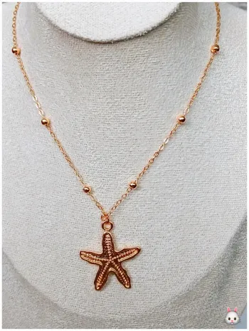 Collier doré pendentif étoile de mer – chaîne fine à billes