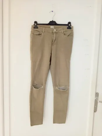 Jeans skinny a trou femme w