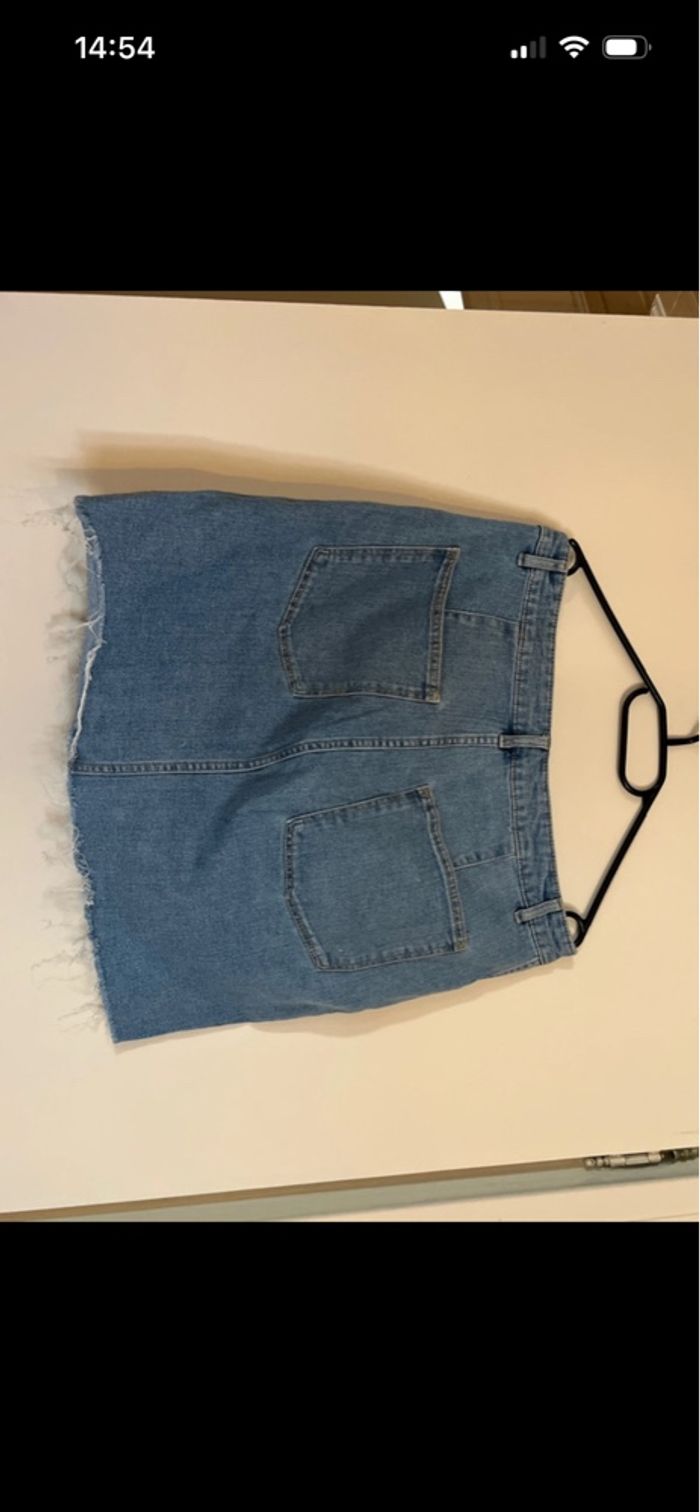 Jupe jean déchiré - photo numéro 4