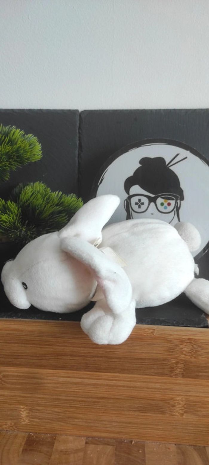 peluche lapin blanc rose couché pompon Hochet Grelot