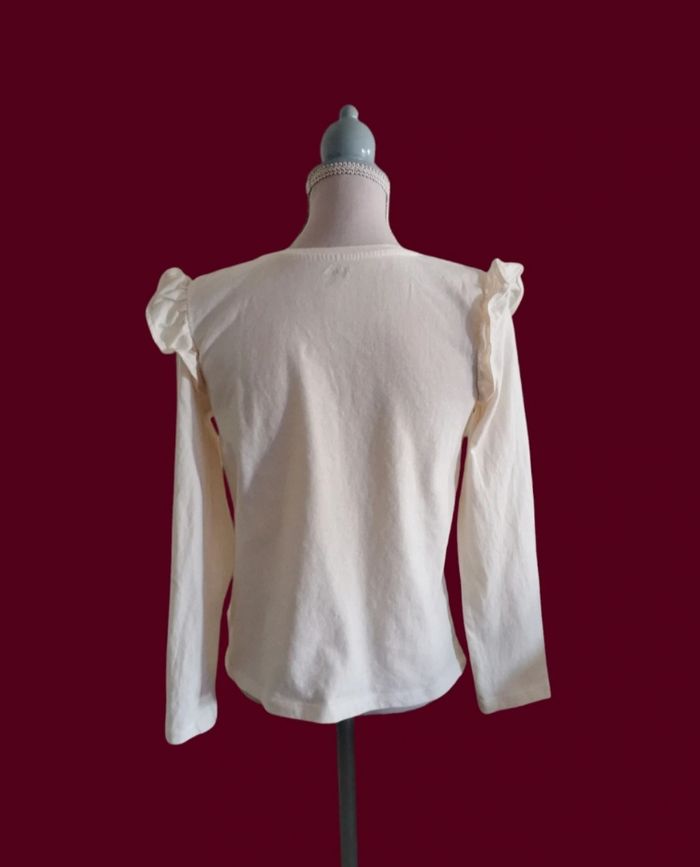 T shirt manches longues blanc froufrous épaules C&A taille 10 ans 2/2 - photo numéro 2