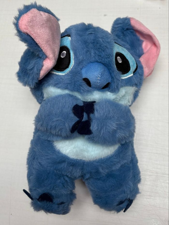 Peluche Stitch ou Angel 28 cm lumineuse , respire, fait plusieurs mélodies 4 modes différents NEUF - photo numéro 6