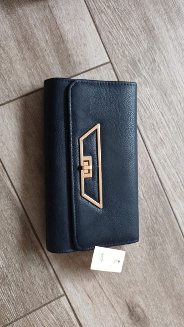 Pochette neuve avec étiquette