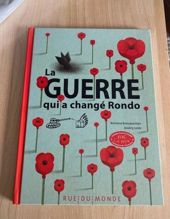 Livre couverture cartonnée neuf, la guerre qui a changé Rondo , édition, rue du monde neuf