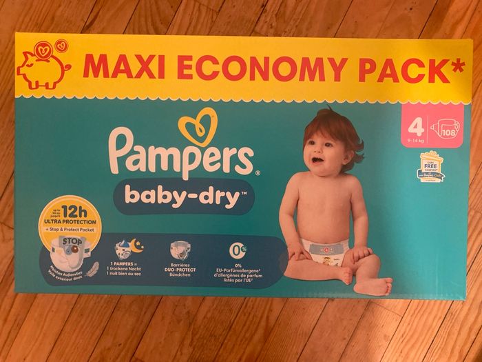Couches Pampers T4