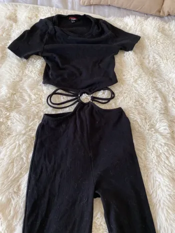 Combinaison noire ouverte au ventre Jennyfer taille XS