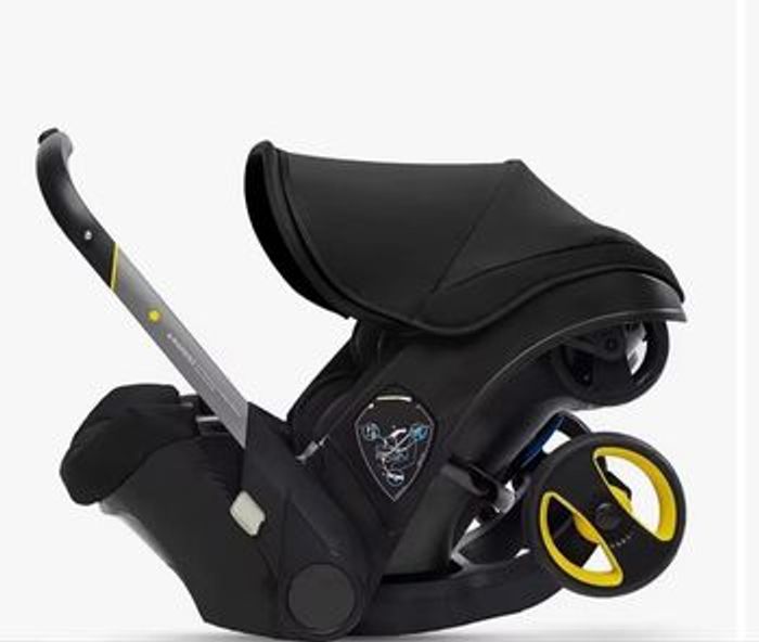 Poussette/ siège-auto doona + base isofix - photo numéro 4