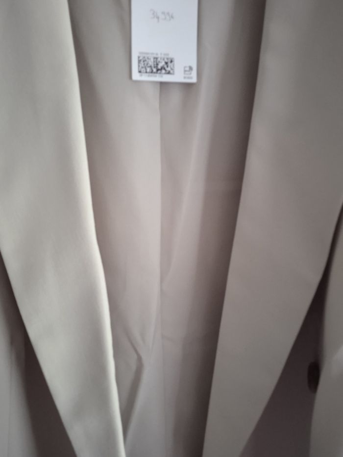 Jolie Veste couleur crème forme overzize - photo numéro 7