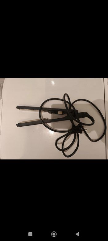 Fer a lisser et brosse lissante