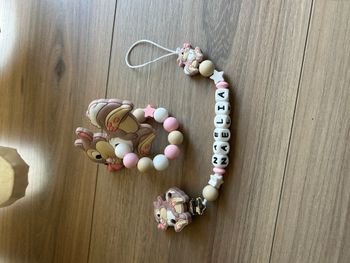 Attache tétine personnalisable et son anneau de dentition 