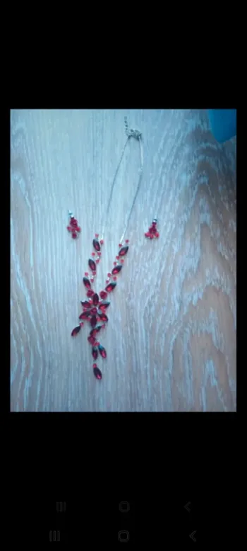 Parure collier et boucles d'oreilles neufs