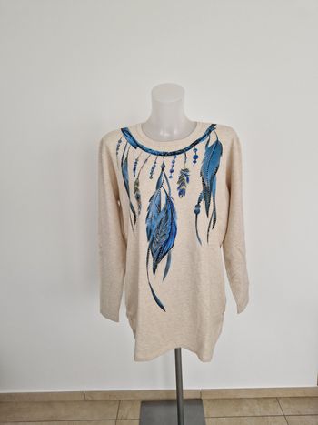 Haut beige crème motif plumes bleues H&L