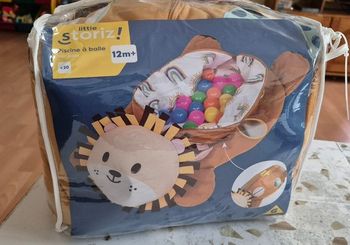 Peluche piscine à balles Lion