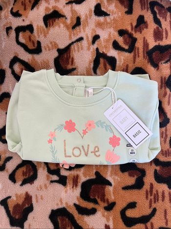 Pull « love » à motif fleurs vert clair Orchestra