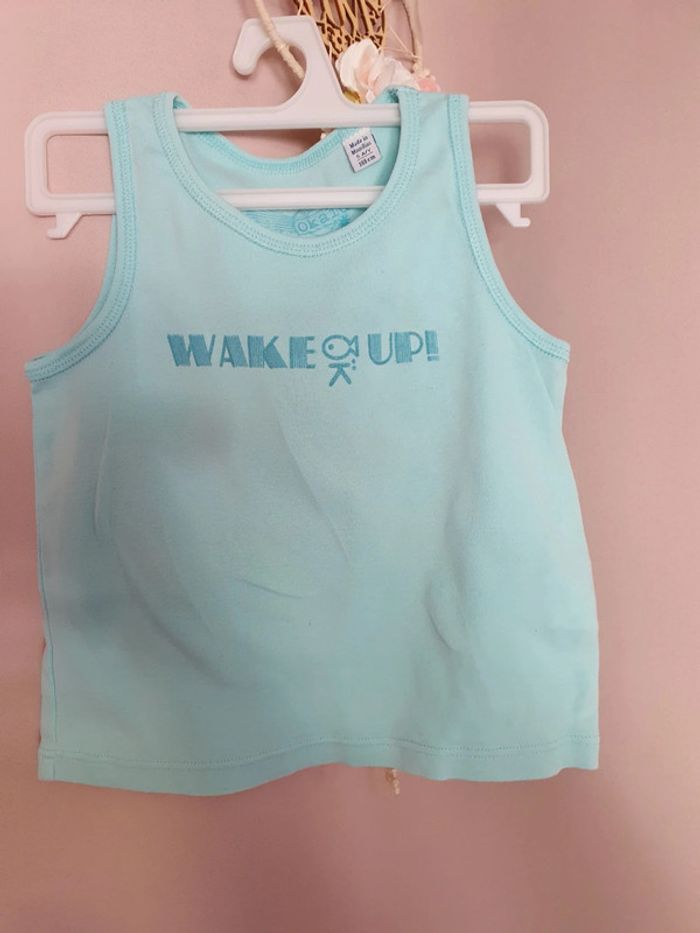 Débardeur bleu turquoise taille 5 ans Okaidi