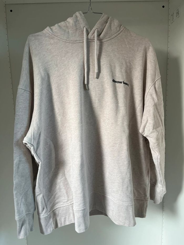 Sweat à capuche à motif fleuri H&M