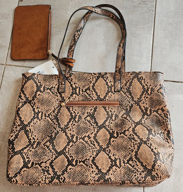 Sac a main reptile rodier et sa pochette neuve