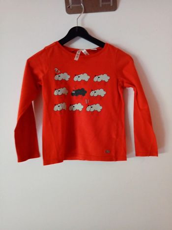 Jolie blouse longues manches orange. 4 ans.