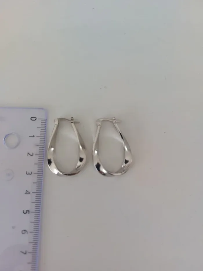 Boucles d'oreilles créoles en acier - photo numéro 3