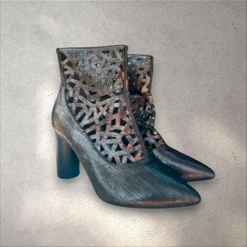 Bottines à talons automne-hiver métallisée en excellent état pointure 41