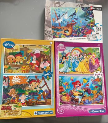 Puzzles Nathan fond de mer et Clementoni  de Disney Pirates et Princesses Très bon état