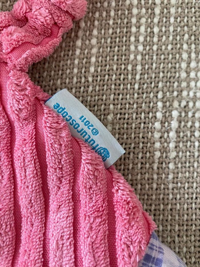 Peluche doudou plat 20cm Futuroscope 2011 ours côtelé rose très bon état - photo numéro 4