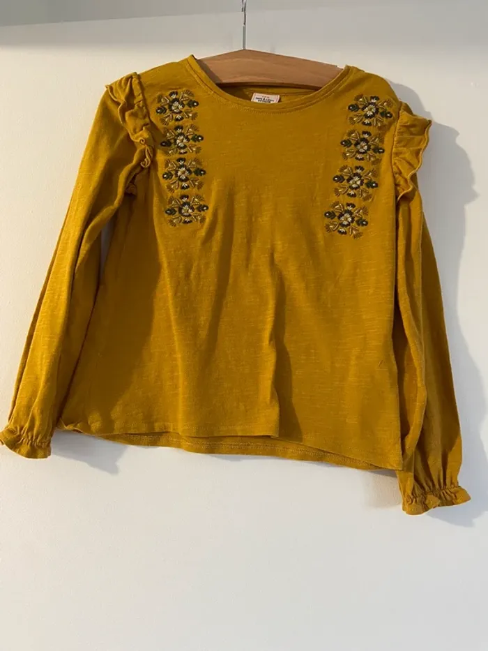 T-shirt manches longues .