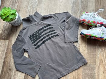 - Haut ML In extenso    - 8 ans - Très bon état  