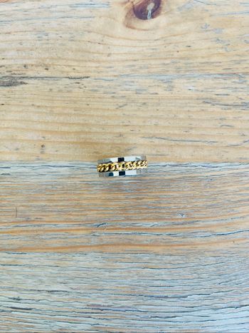 Bague bicolore rotative