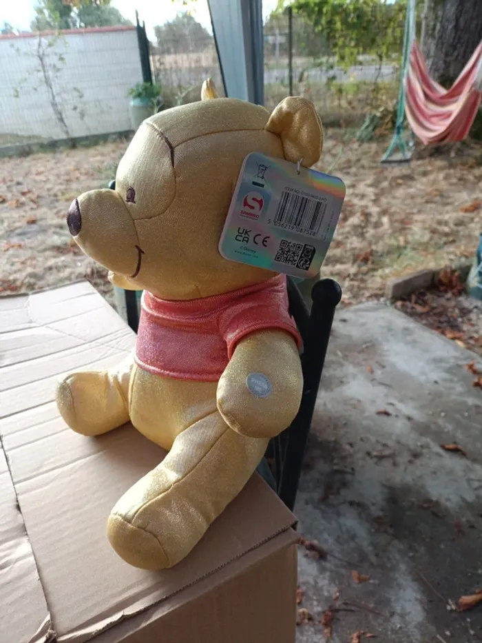 Peluche doudou Winnie l'ourson musical Disney - photo numéro 2