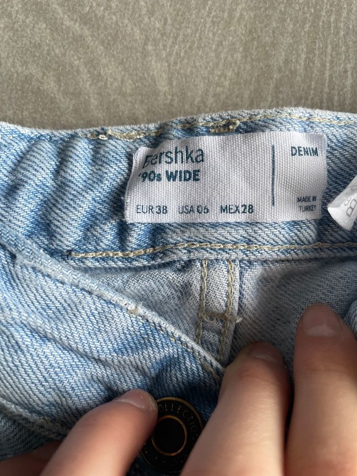 Jeans bleu à trou - photo numéro 2