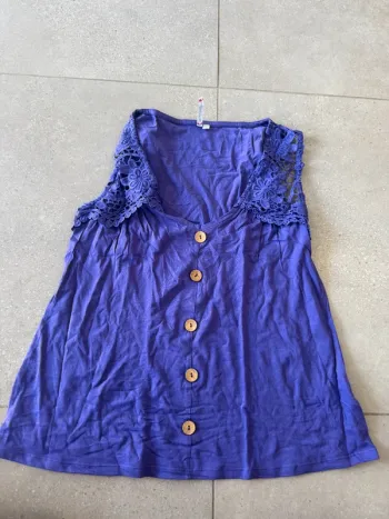 Haut sans manches violet blanche porte, taille 38/40, très bon état