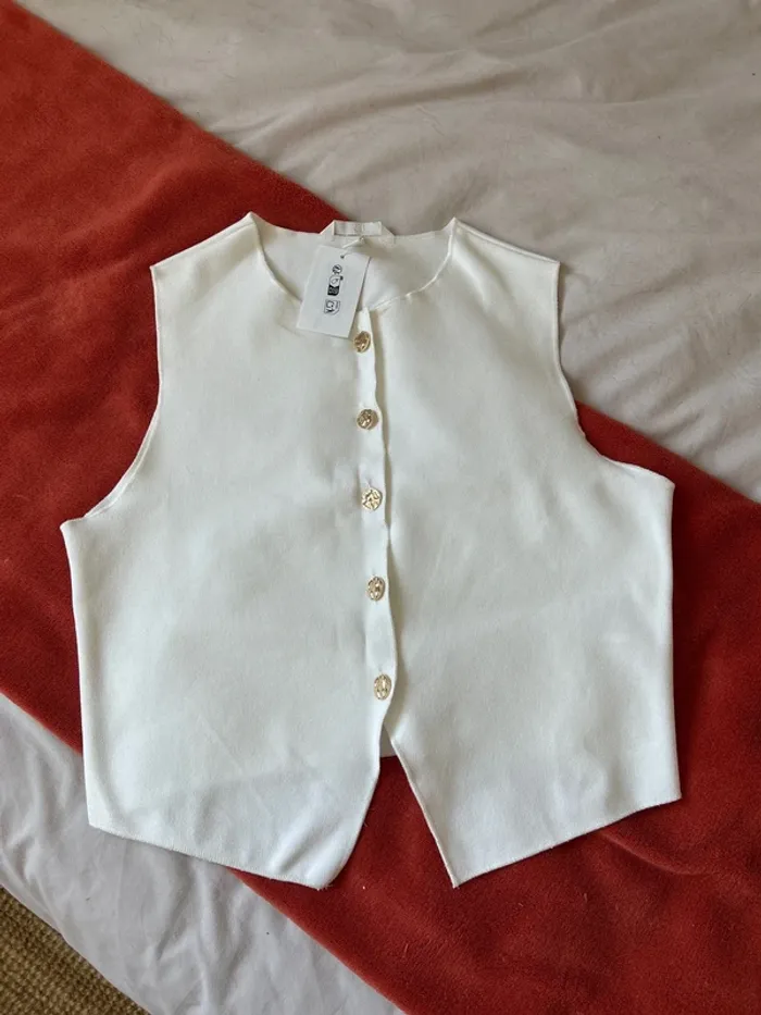 Top/gilet