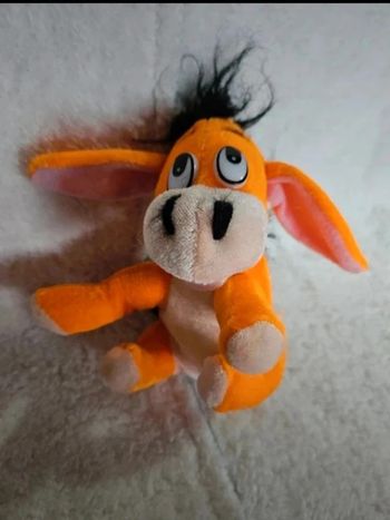 Peluche en petit âne orange