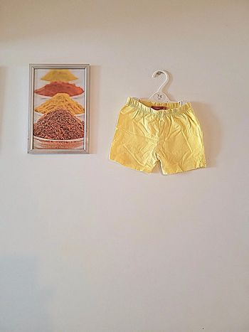 Short léger jaune tissaia taille 18 mois