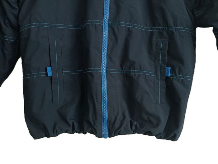 Veste blouson bleu marine à capuche. Quechua. Taille 10 ans. 133 - 142 cm - photo numéro 4
