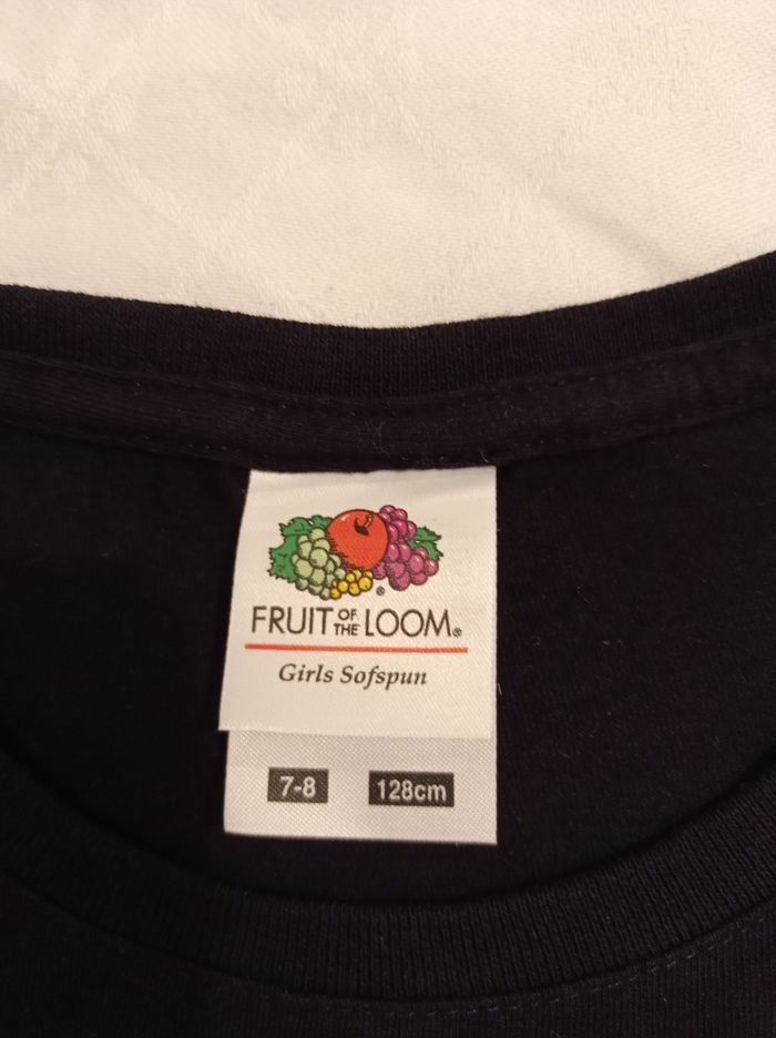 Polo pour fille en noir avec inscription devant voir photos taille 7. Oui 8 ans 128 cm couleur noir avec inscription devant et photos voir photos - photo numéro 4