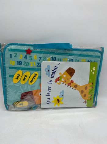 Le premier calendrier de Monsieur Girafe avec son calendrier tissu et ces pièces Velcro